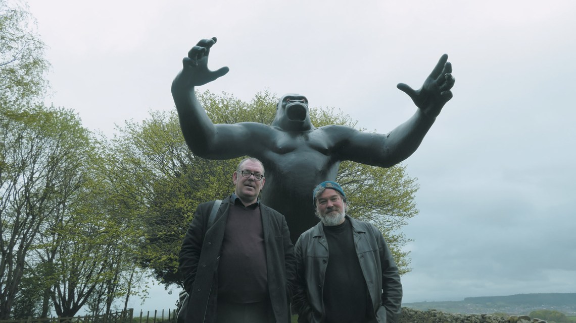 Robert Lloyd and Stewart Lee in front of Nicholas Monro’s sculpture of King Kong, Cumbria, England