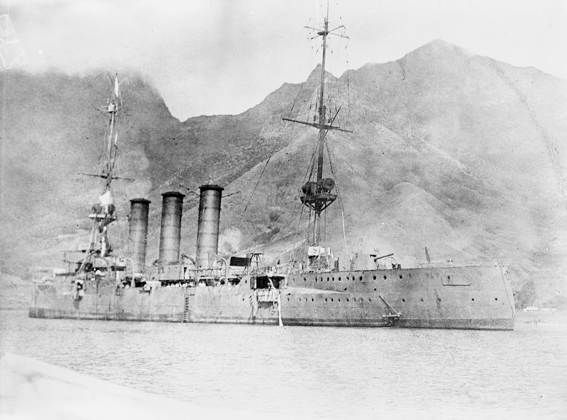 The German cruiser SMS Dresden flying a flag of surrender after being attacked by British ships off coast of Robinson Crusoe Island, Chile, 1915