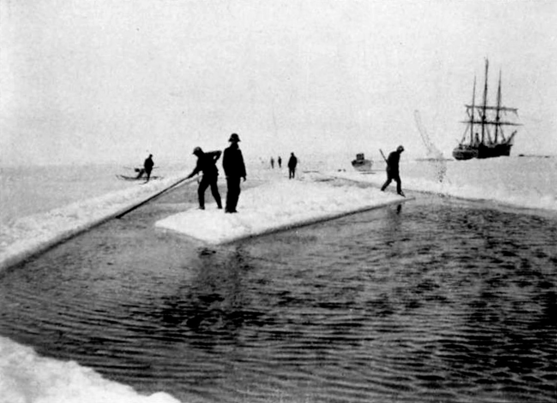 Crew members cutting a canal through the ice to free the Belgica