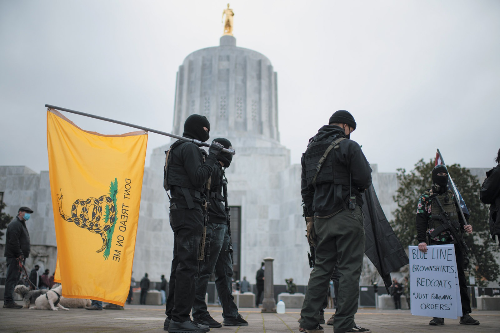 Armed members of the Boogaloo Bois in front of the Oregon State Capitol during a ­nationwide protest called by far-right groups in support of President Trump and his claim of electoral fraud