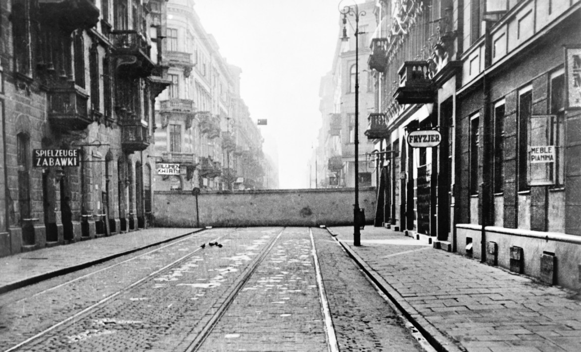 The wall encircling the Jewish ghetto, Warsaw, Poland, December 1940