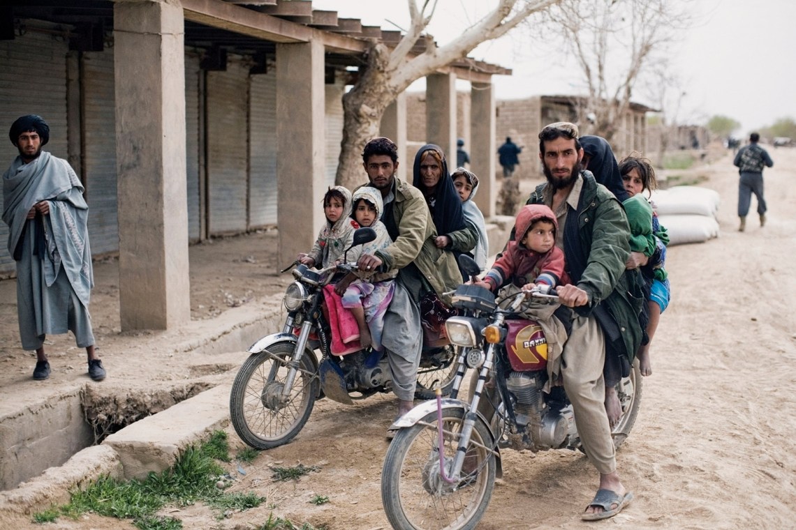 Residents of Marja returning to their village after it was retaken from the Taliban by US and Afghan forces, 2010