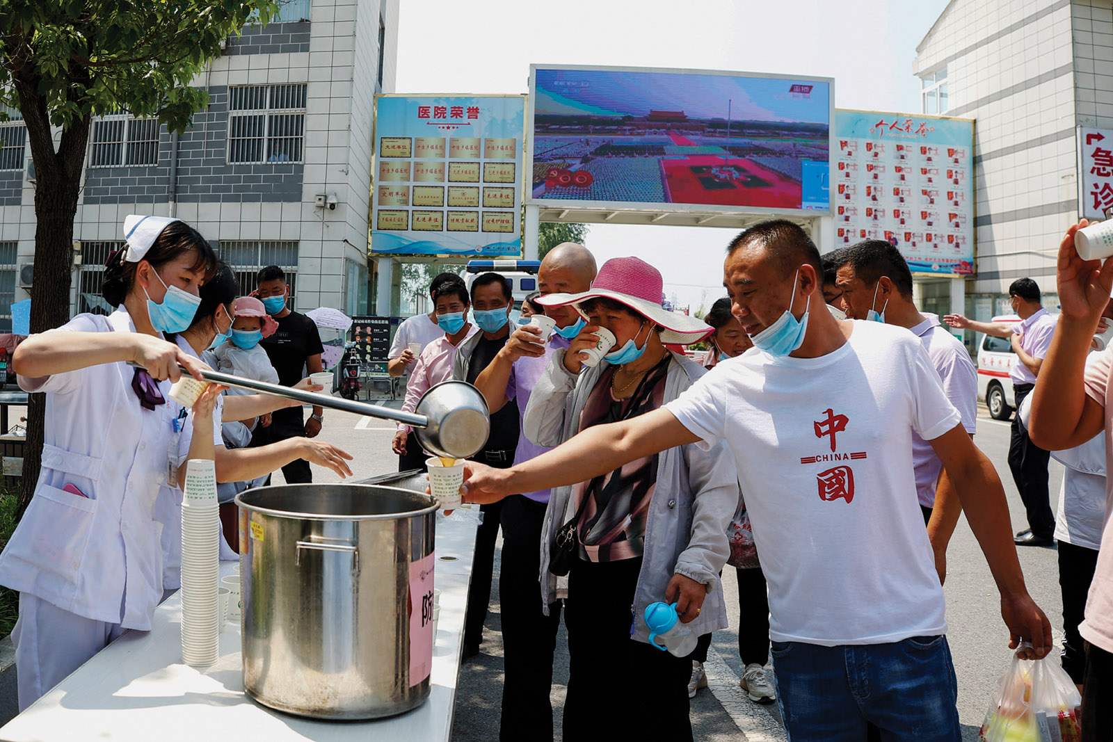 Chinese medicine being distributed for free during a rise in Covid-19 cases, Suqian, Jiangsu province, China