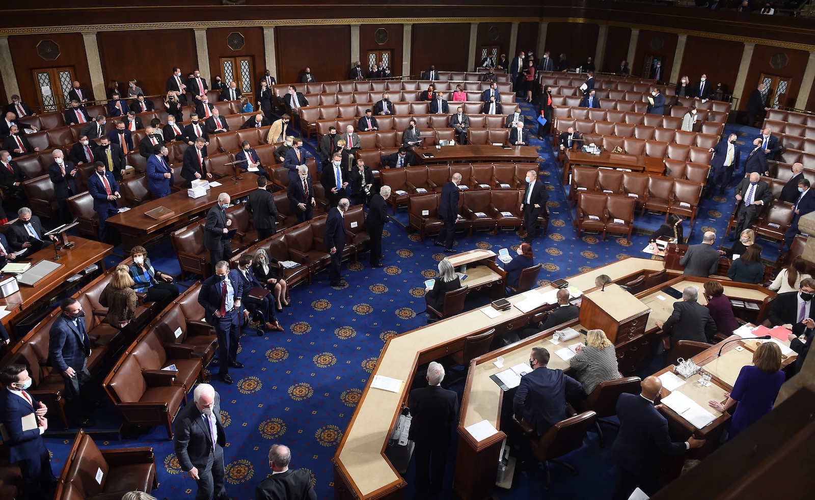 Members of Congress gathered in joint session preparing to evacuate