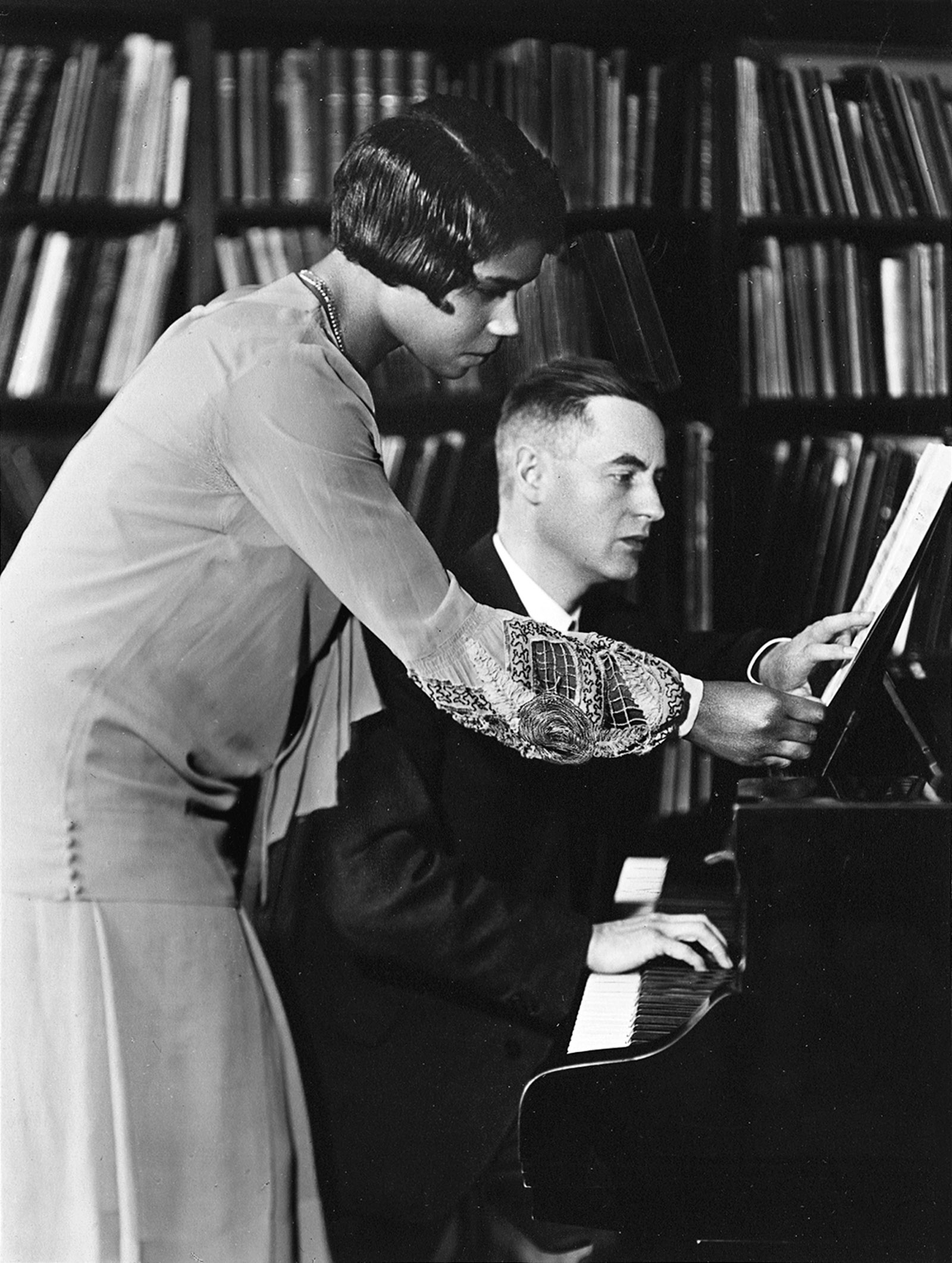 Marian Anderson studying a musical score with the pianist Kurt Johnen