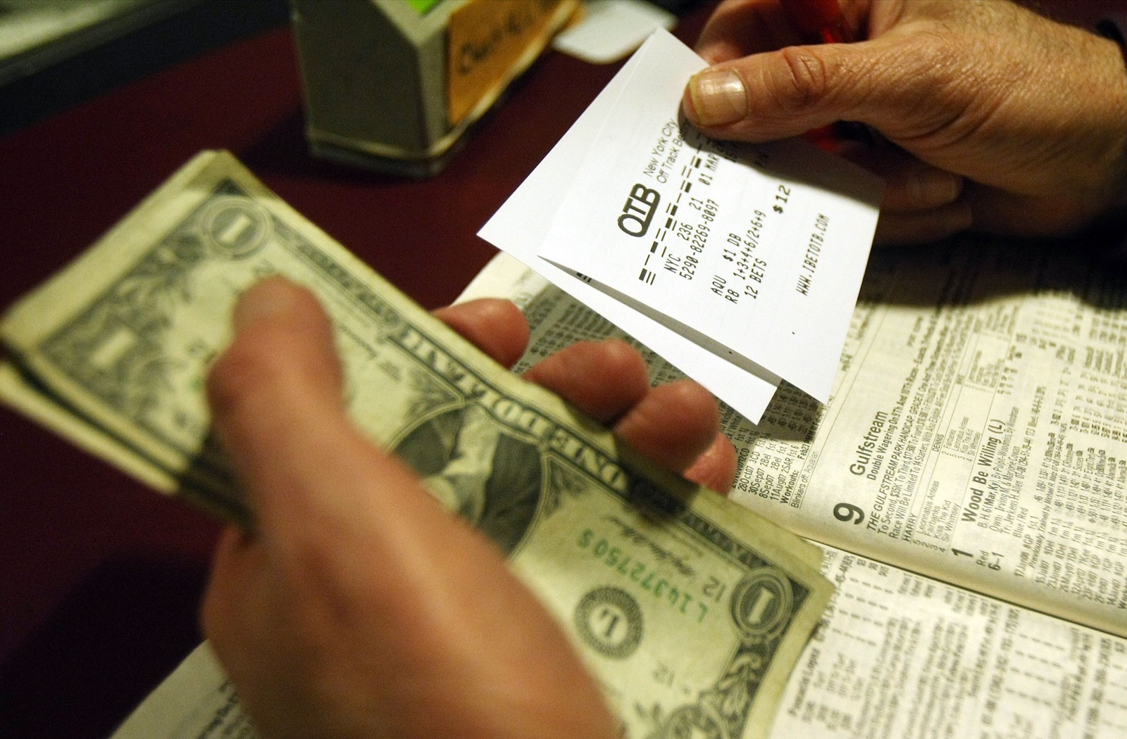 Betting slips and cash