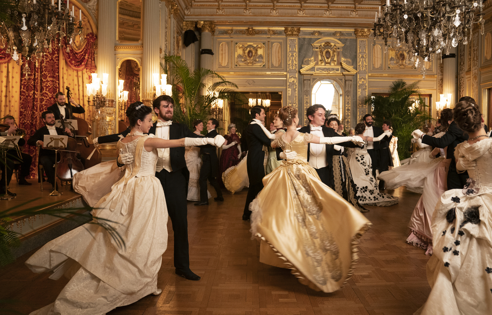 dancers swirling around a Gilded Age ballroom