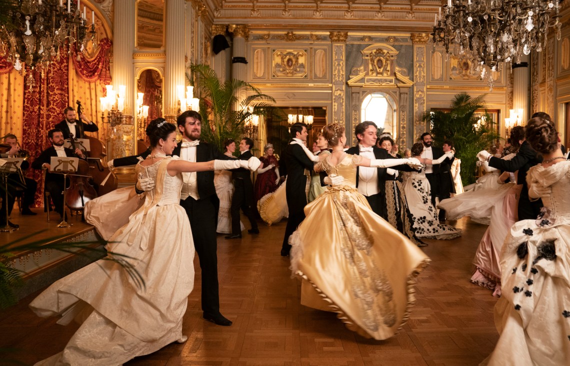 dancers swirling around a Gilded Age ballroom