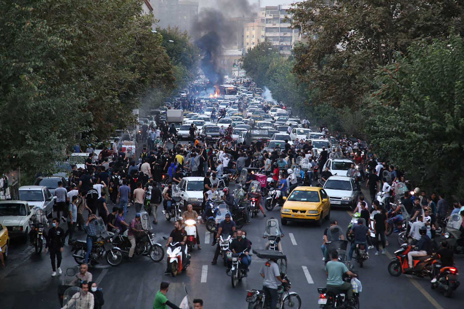 Protesters in the streets of Tehran days after Mahsa Amini died in police custody, September 21, 2022