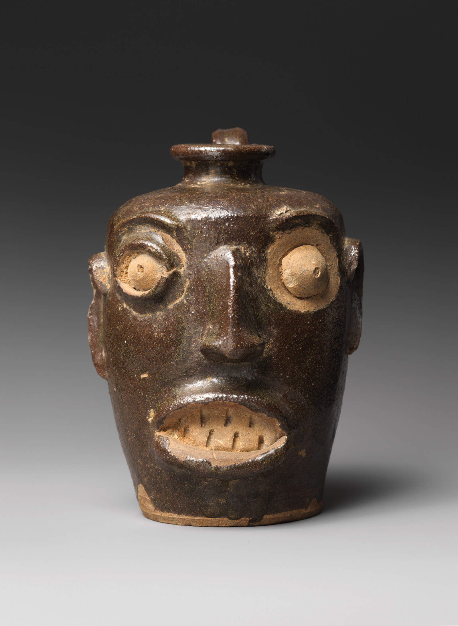 A face vessel by an unrecorded potter
