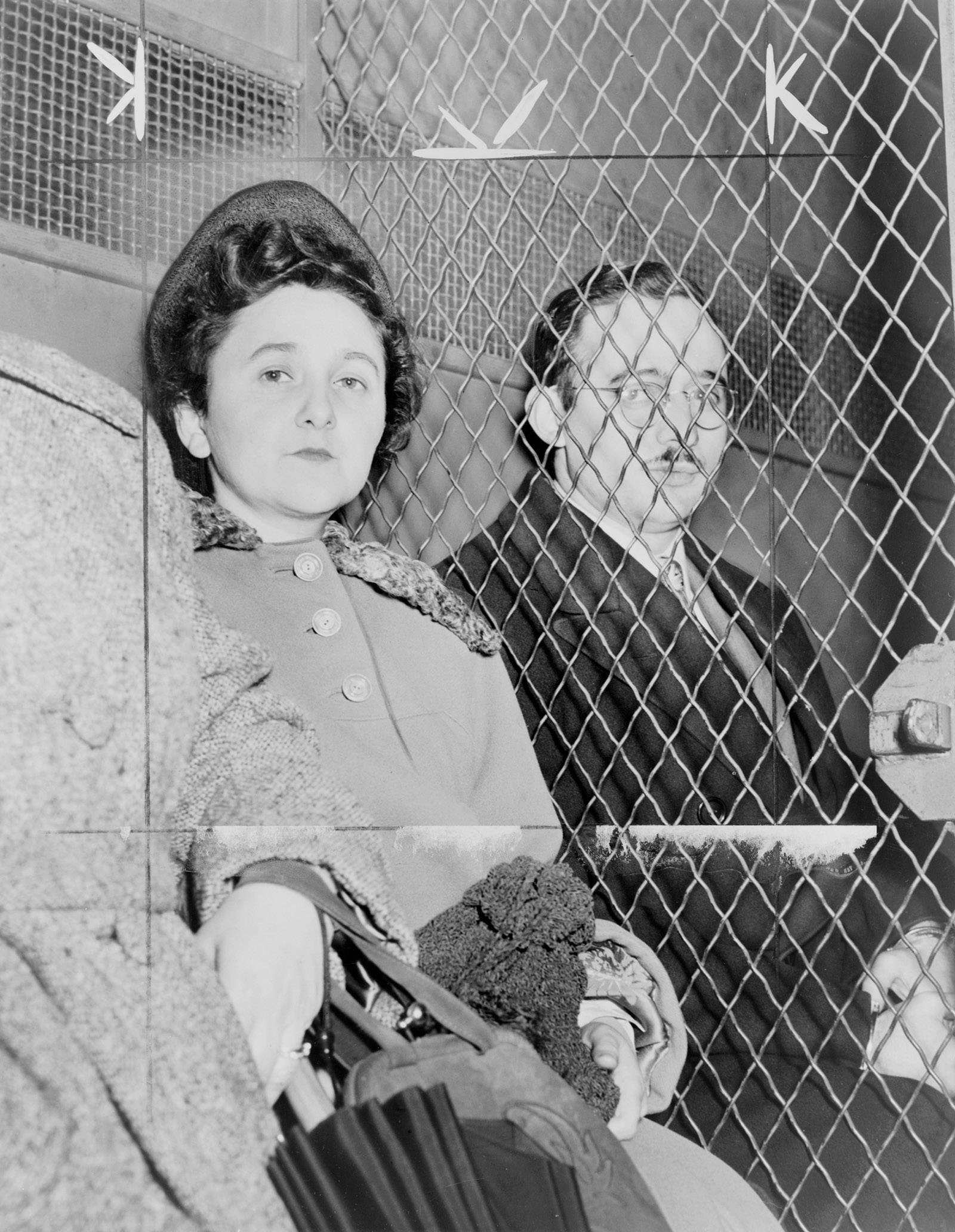 Ethel and Julius Rosenberg leaving the courthouse in a prison van after being found guilty of conspiracy to commit espionage