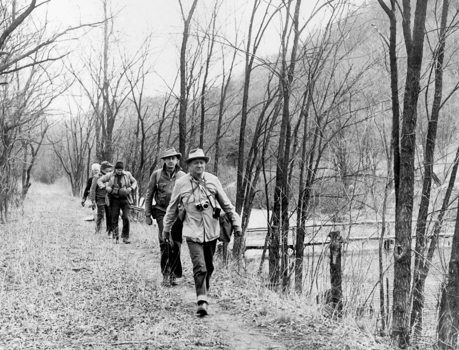Supreme Court Justice William O. Douglas leading Washington Post editors on a hike along the Chesapeake and Ohio Canal