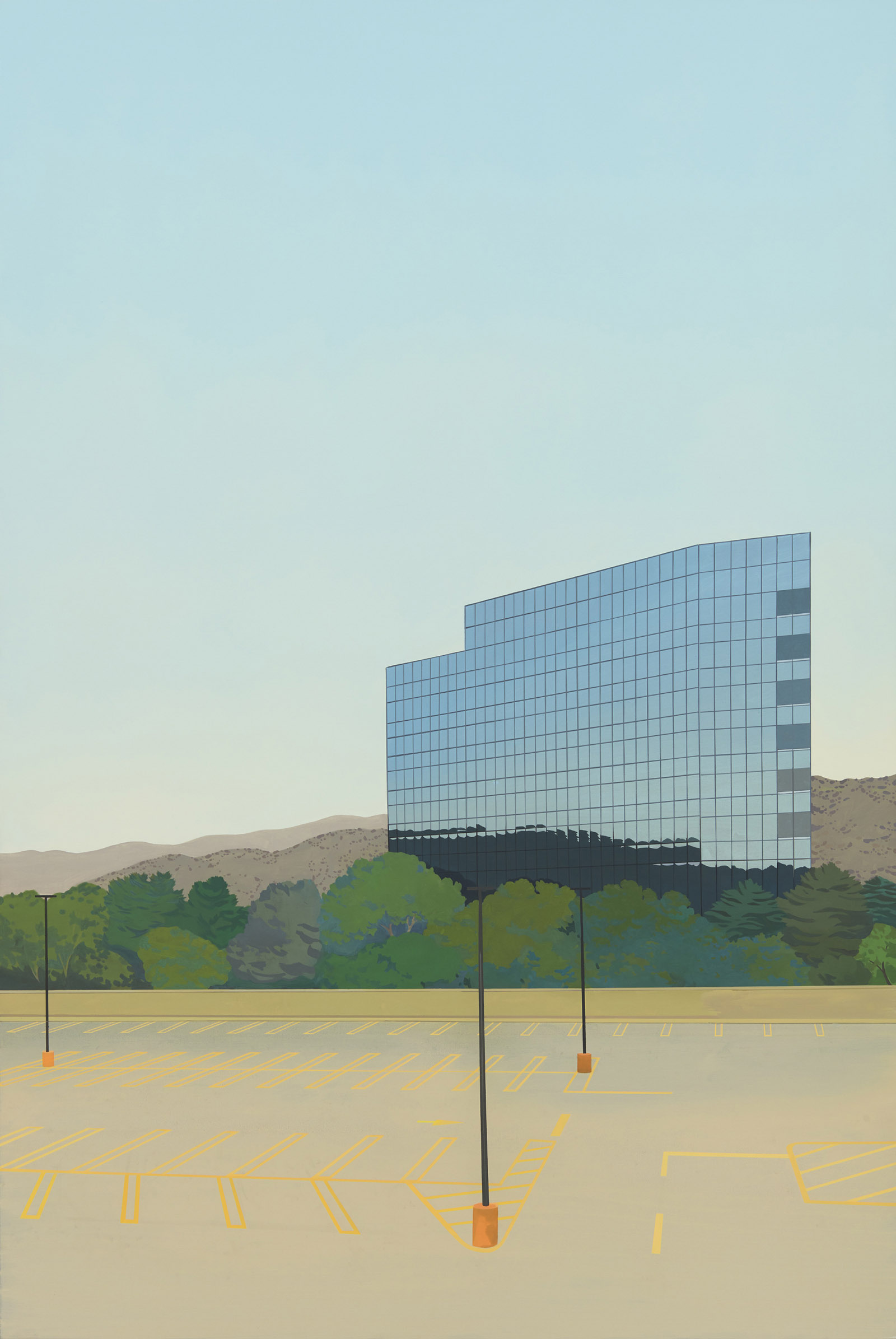 An empty parking lot with trees and a glass office building in the background