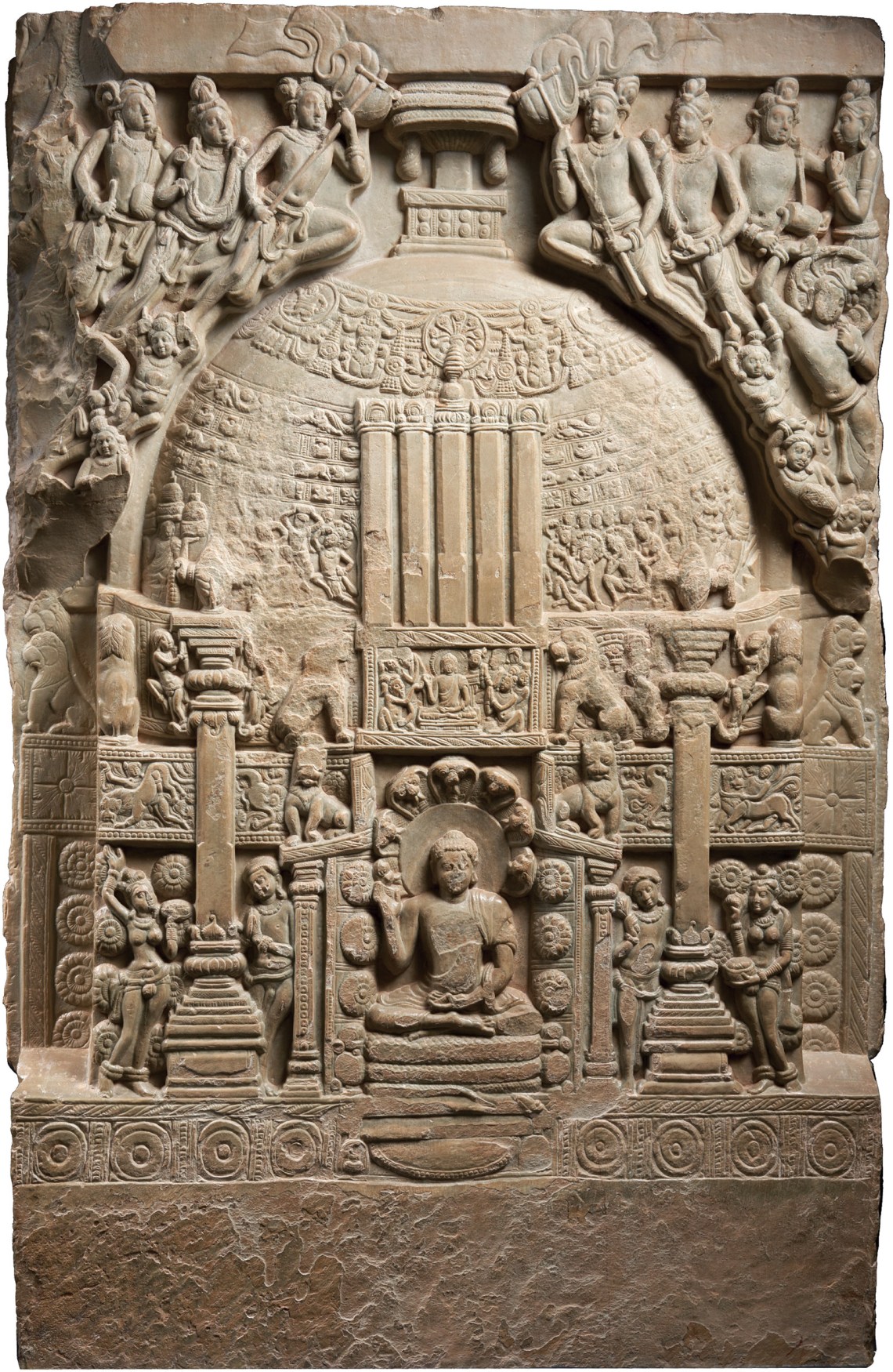 Stupa panel depicting the Buddha protected from a storm by a snake deity