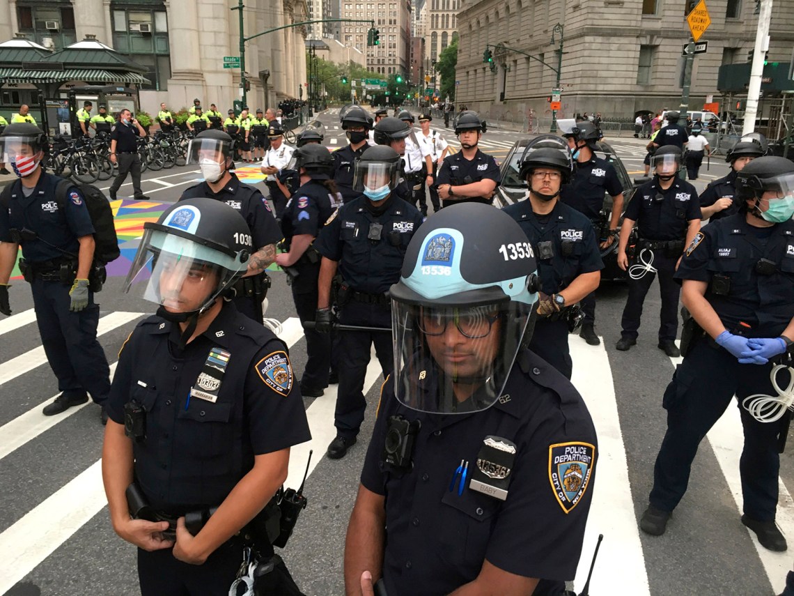 Police officers at an LGBTQ-led Black Lives Matter protest