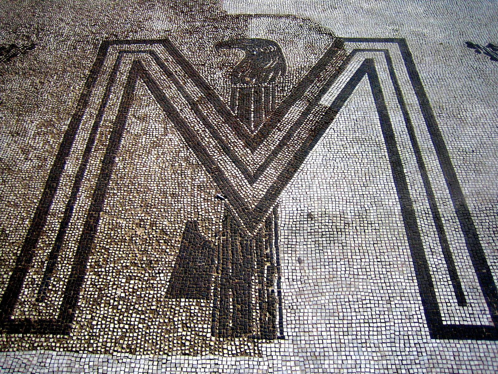 A mosaic displaying the fasces and Mussolini’s initial at the Foro Italico