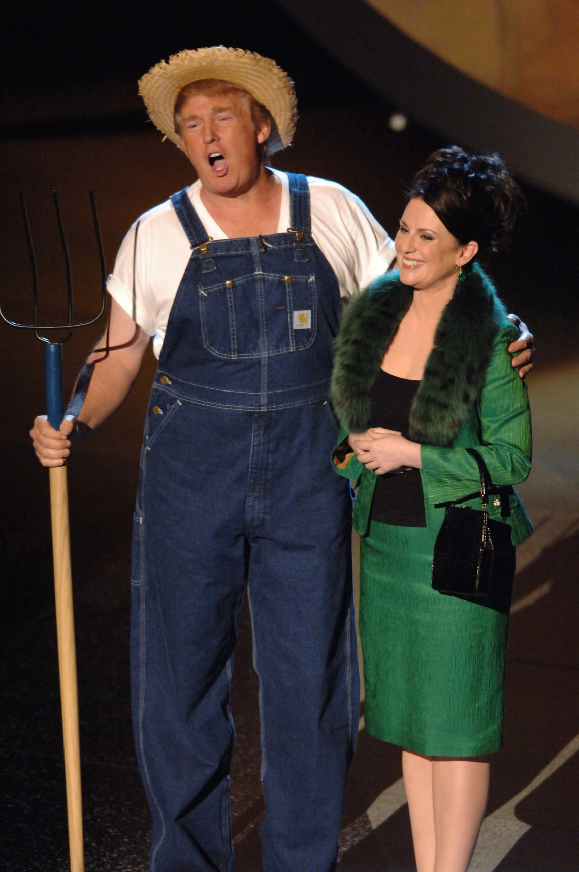 Donald Trump and Megan Mullally performing the Green Acres theme song at the Emmy Awards, 2005